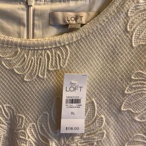 Semi-formal cream colored Loft dress.